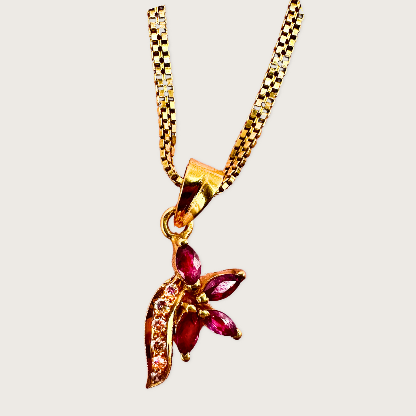 Ruby Breeze – 18K Gold Marquise Ruby & Diamond Pendant