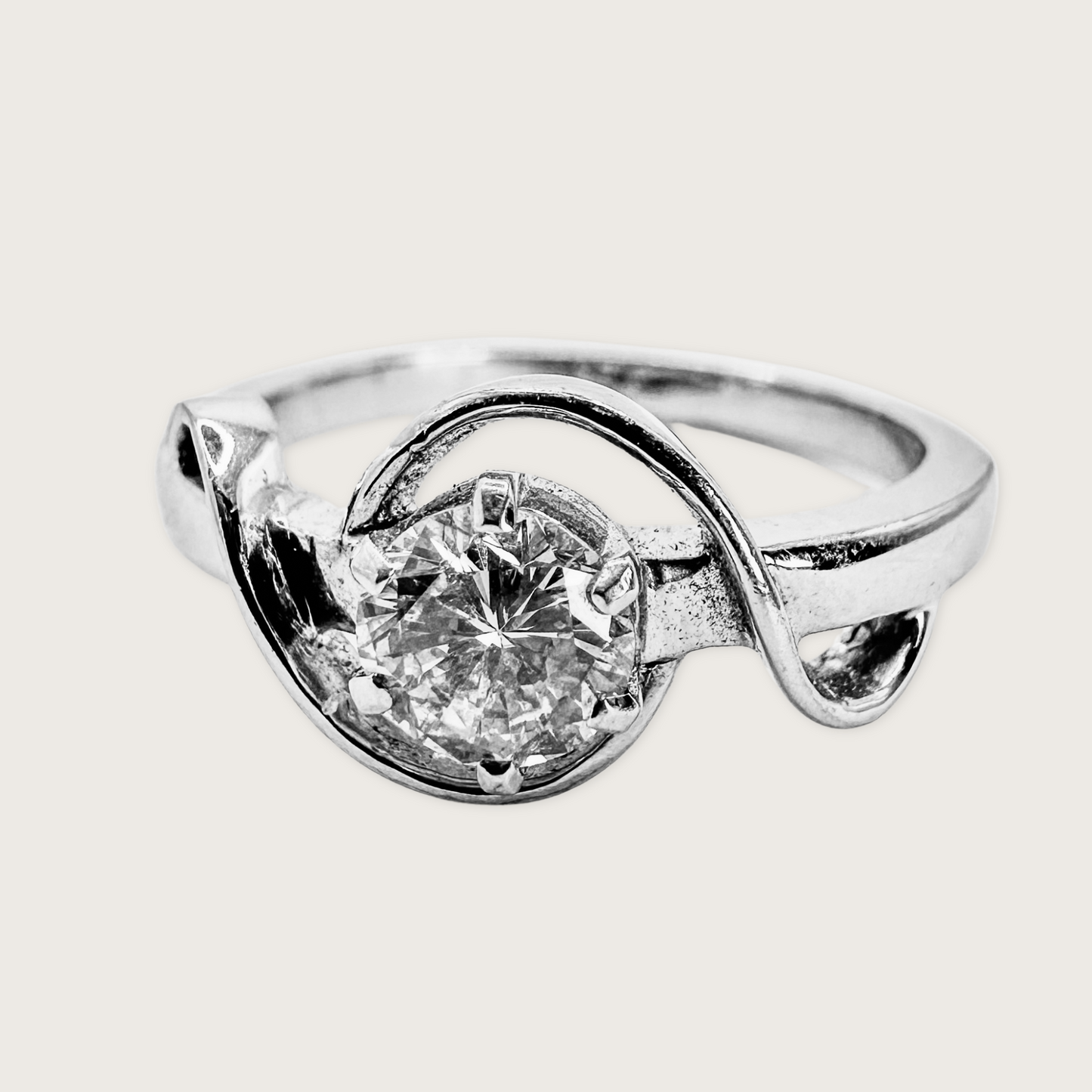 Infinite Grace – Diamond Twist Ring in 18KT White Gold