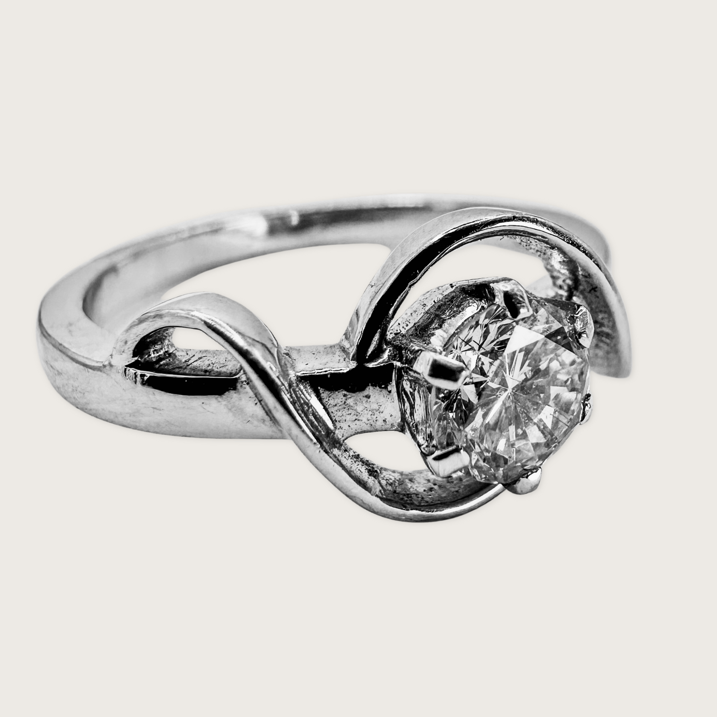 Infinite Grace – Diamond Twist Ring in 18KT White Gold