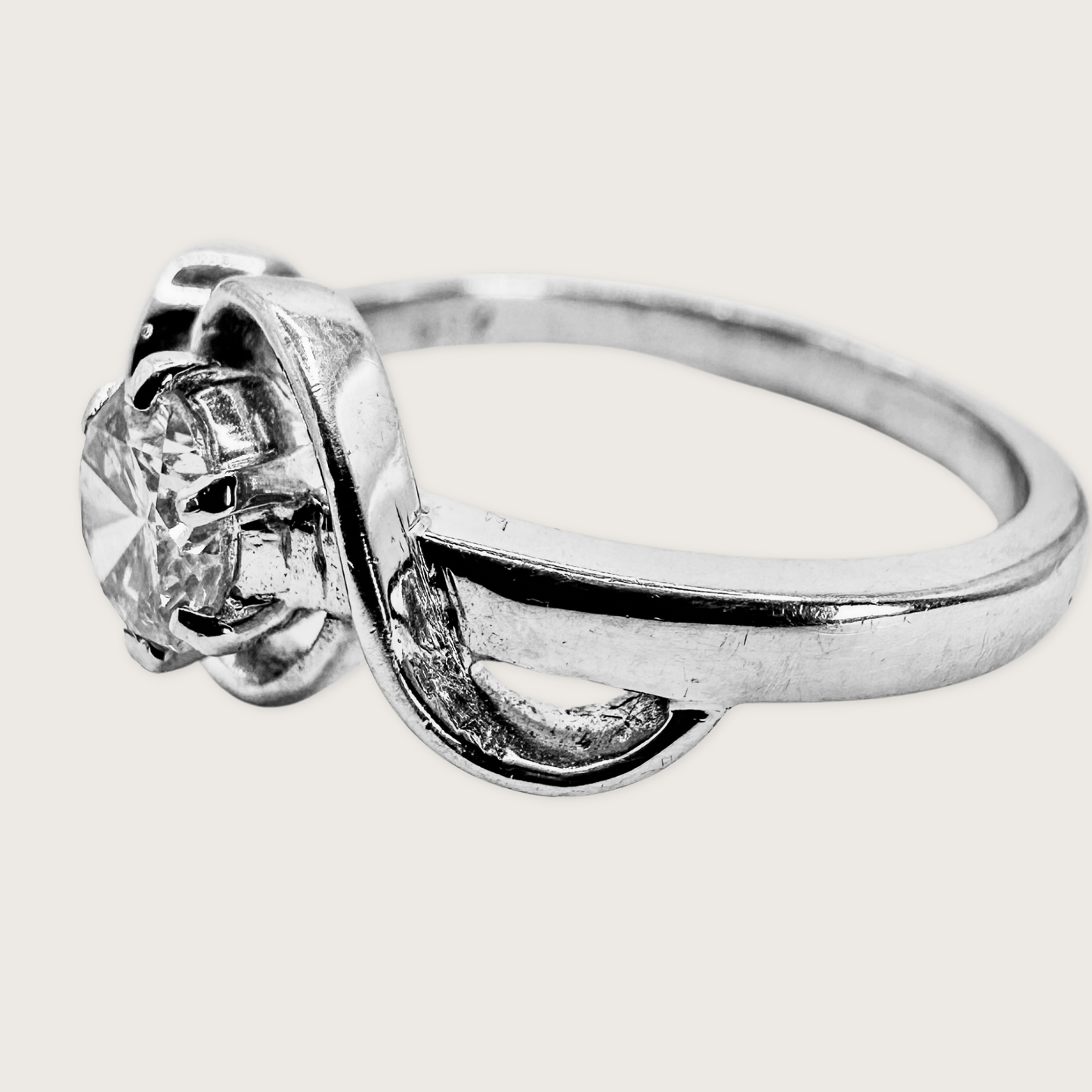 Infinite Grace – Diamond Twist Ring in 18KT White Gold