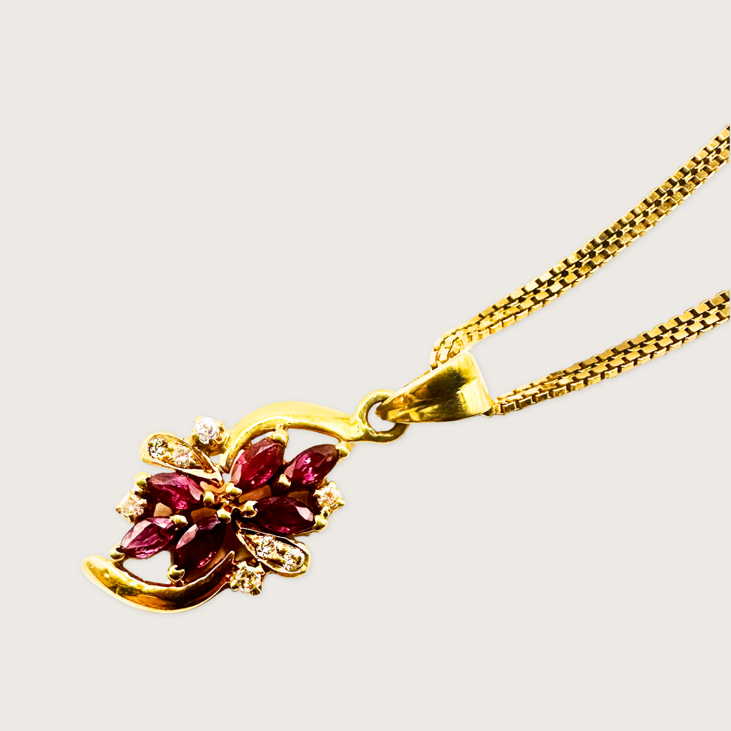Ruby Bloom – 18K Gold Marquise Ruby & Diamond Pendant